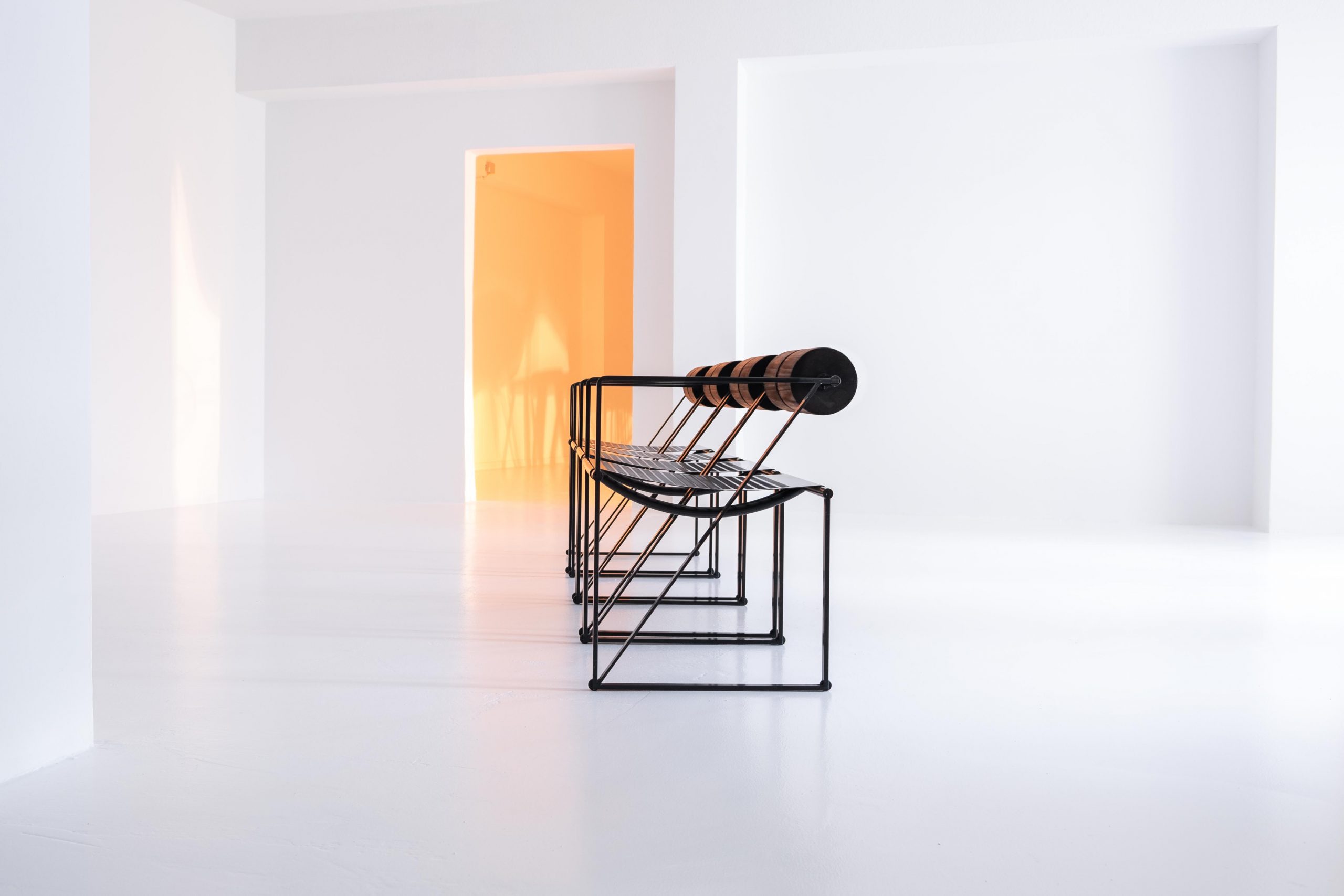 Seconda Chair how to sit on a building. | antibeige